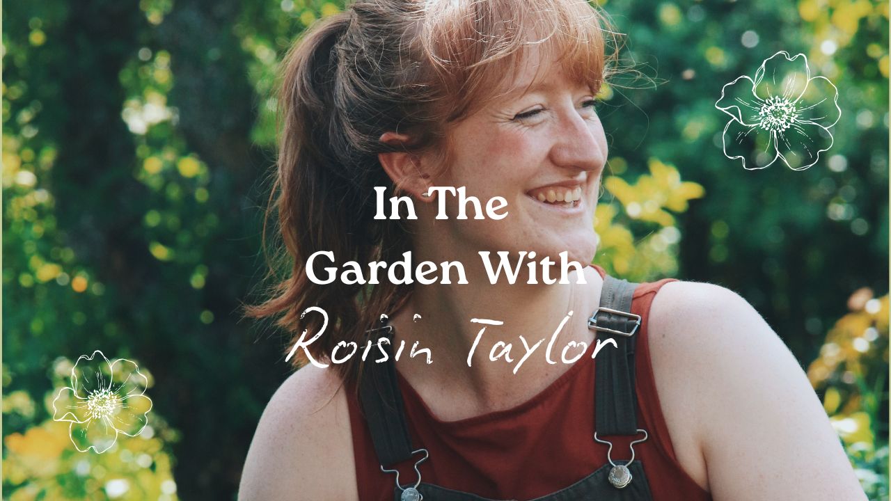 Close-up photo of young woman with bangs smiling, looking off to the right with a sun-dappled garden in the background. Cover text says 'In The Garden With Roisin Taylor'